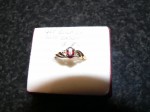 Ladies 9ct gold ring with Garnet and Diamonds. Click for more information...