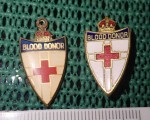 5313 2 x old blood donor badges Qc and kc. Click for more information...