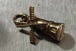 j81 Old 9ct gold charm Dutch windmill. Click for more information...