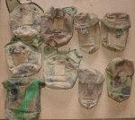 assorted Australian army DCPU pouches and bottle covers. Click for more information...