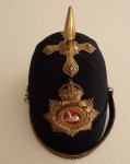 1909 dated British blue cloth helmet South Lancashire. Click for more information...