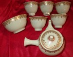 Antique Japanese satsuma tea set. Click for more information...