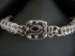 Silver Box chain mail bracelet with garnet clasp. Click for more information...