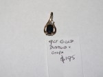 9ct Gold Diamond and Onyx set pendant. Click for more information...