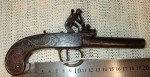 Silver wire inlaid English flintlock pistol with screw of barrel. Click for more information...
