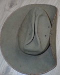 Battered old Australian slouch hat Korea or Nam era. Click for more information...